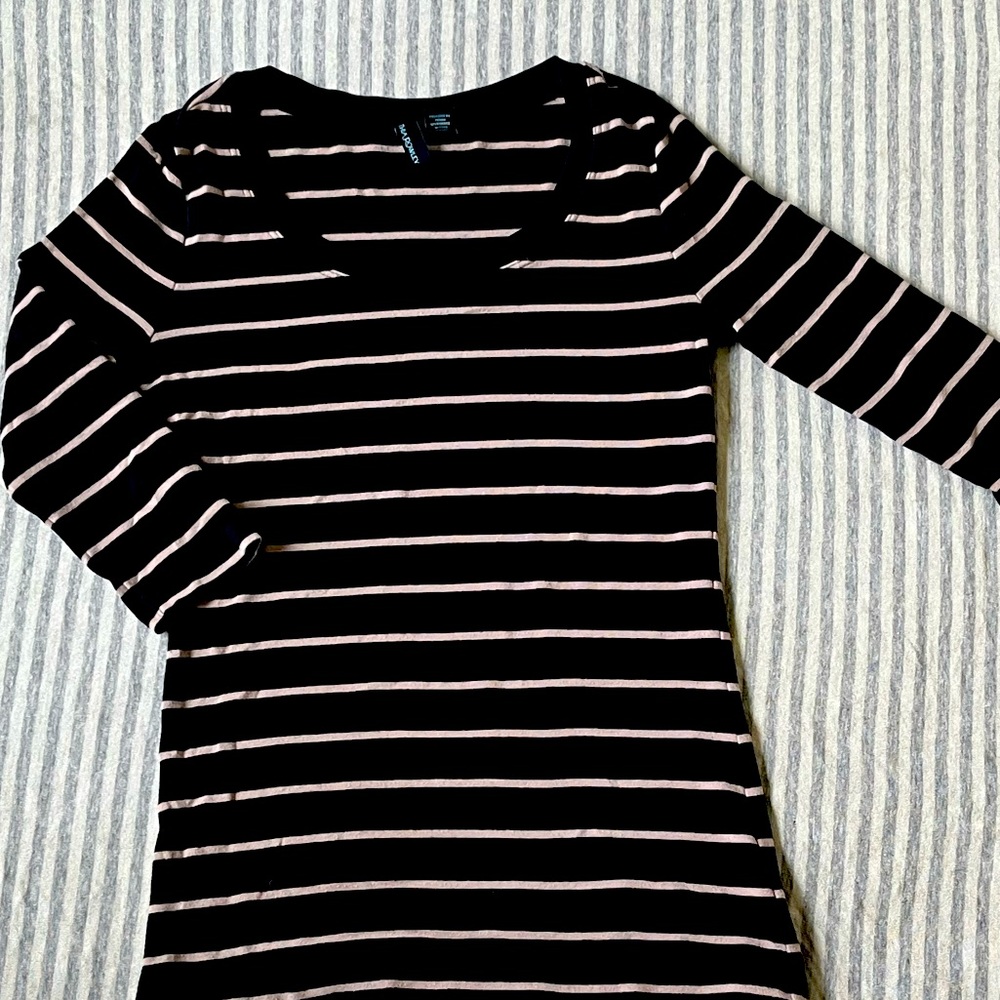 black and cream colored shirt